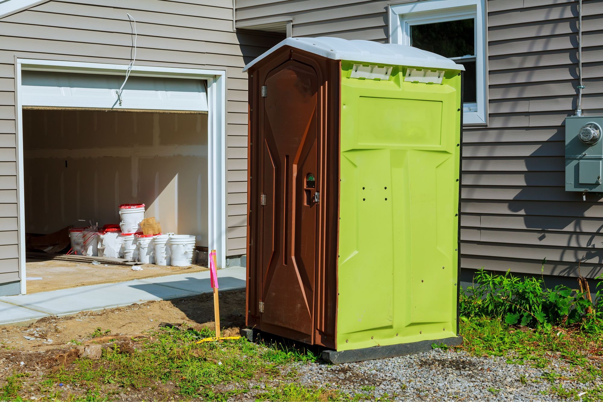 portable-restroom-on-a-new-structure-near-a-new-ho-2025-03-27-05-14-09-utc